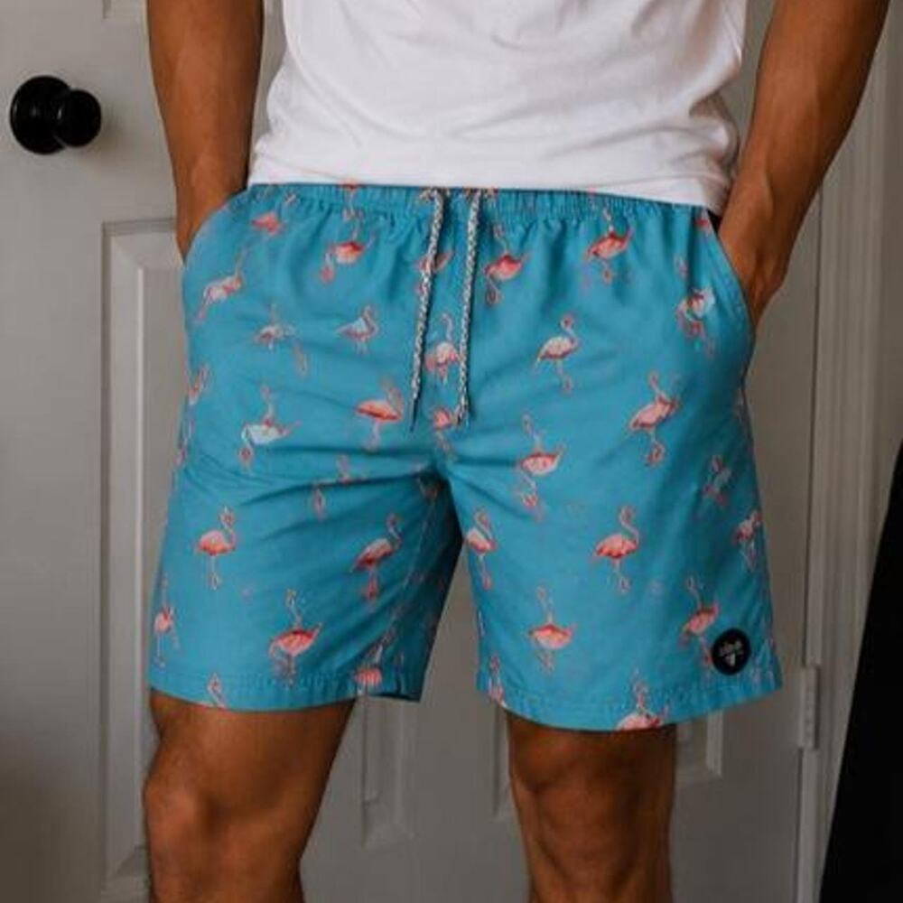 Blue swim shorts with pink